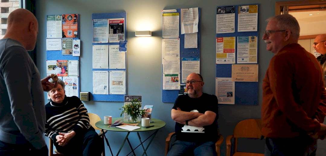 People haveing tea after worship at Hammersmith Quaker Meeting